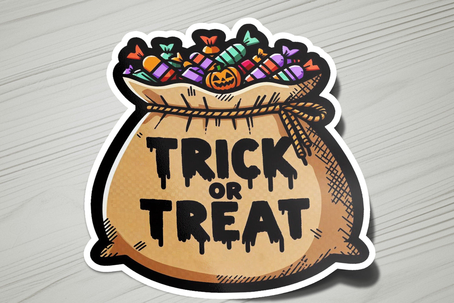 a sticker that says trick or treat in a bag