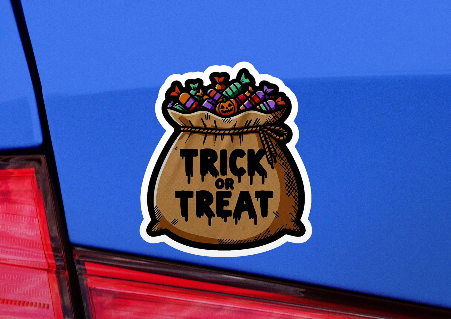a sticker that says trick or treat in a bag