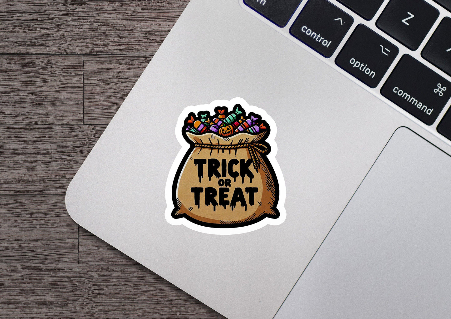a sticker that says trick or treat in a bag