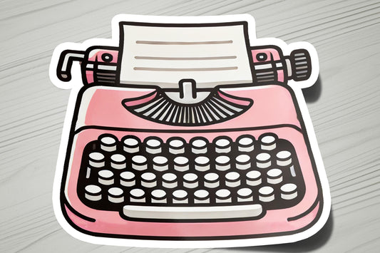 a sticker of a pink typewriter