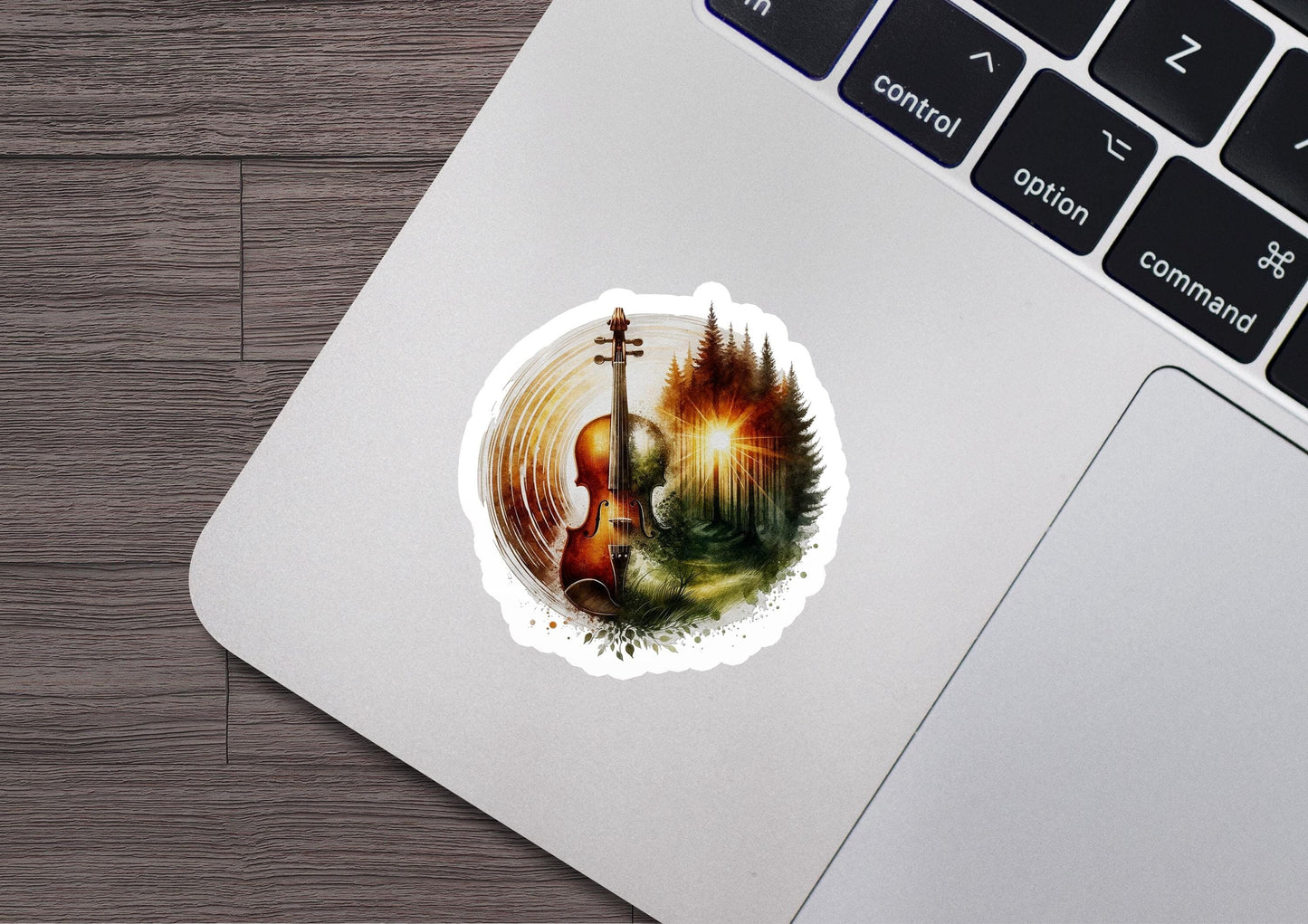 a sticker of a violin in the woods