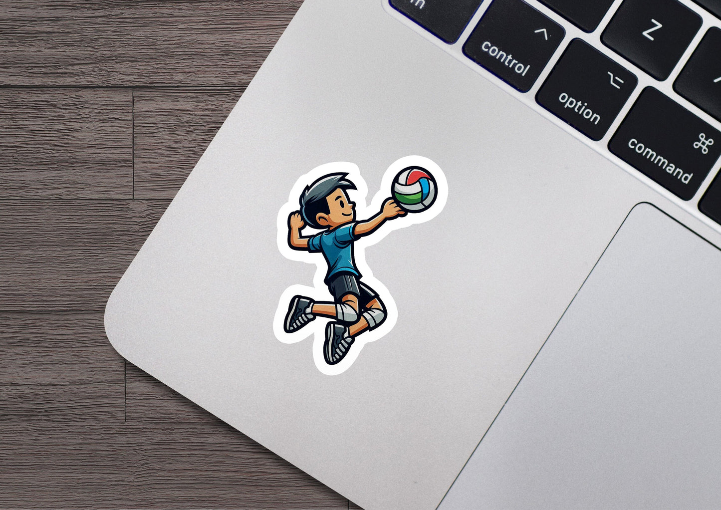 a sticker of a boy playing with a ball