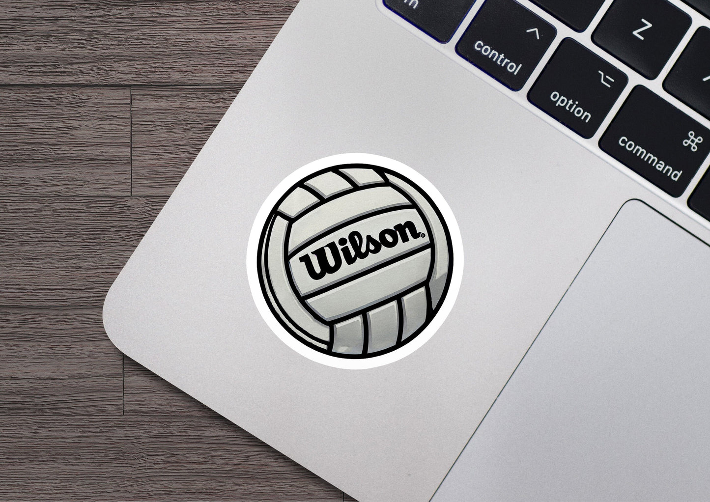 a close up of a laptop with a sticker on it