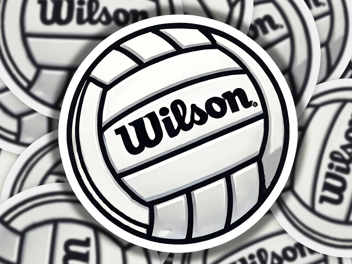 a pile of wilson volleyball stickers sitting on top of each other