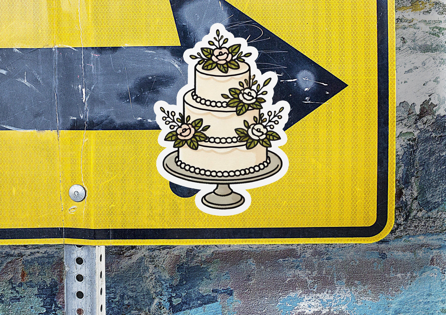 a yellow and black sign with a cake on it