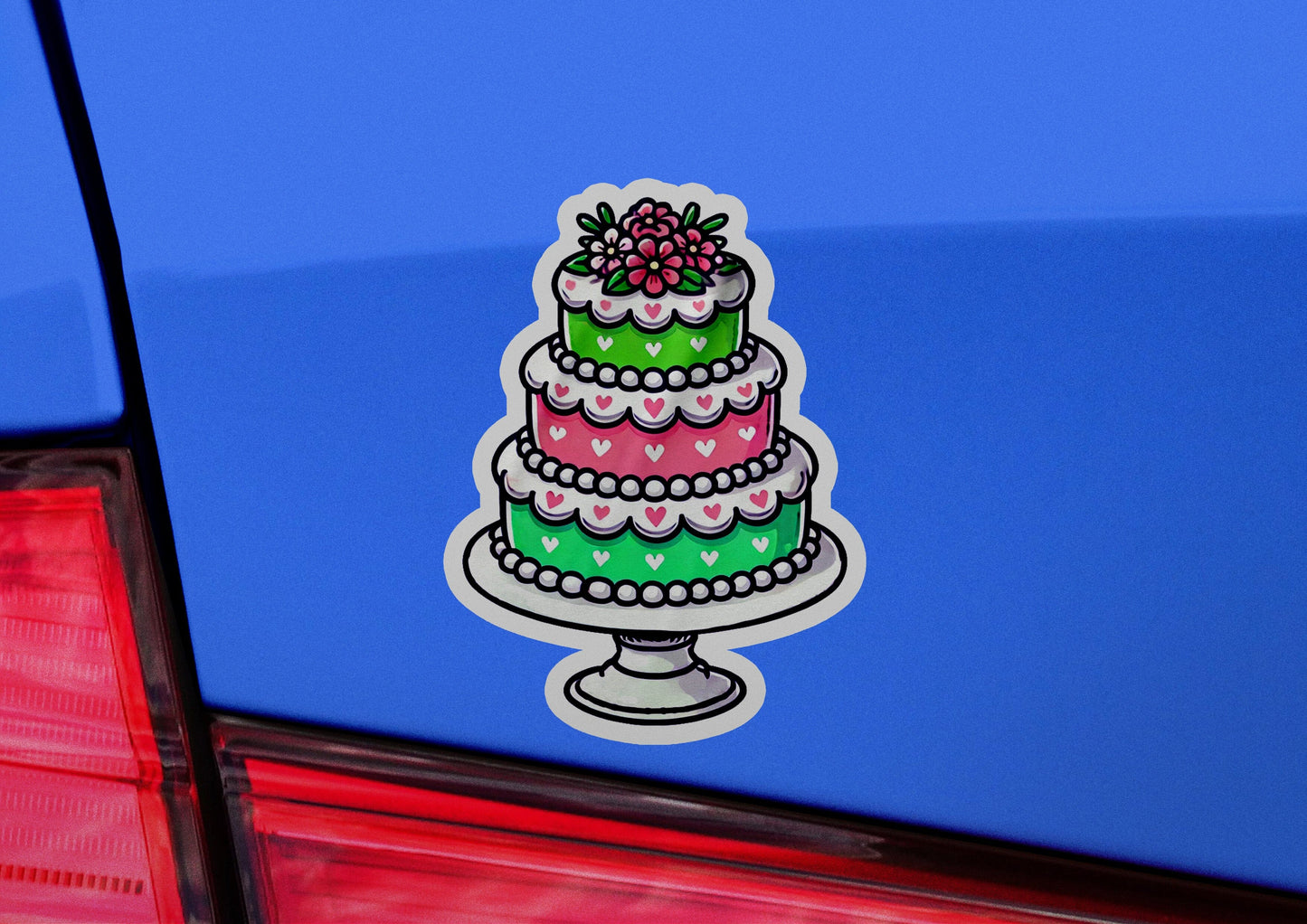a cake sticker on the back of a car