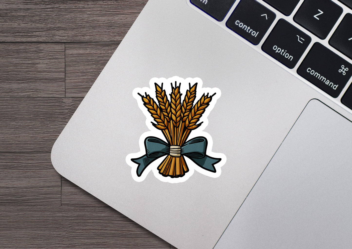 a sticker of a bunch of wheat on a laptop