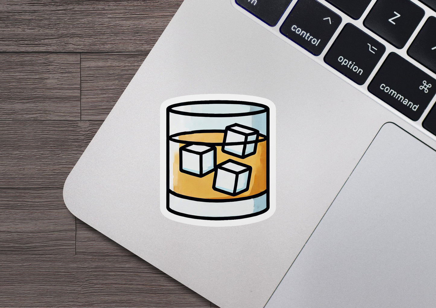a sticker of a glass of beer on a laptop