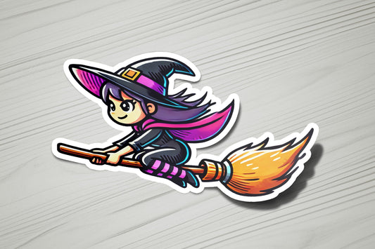 a sticker of a witch flying on a broom