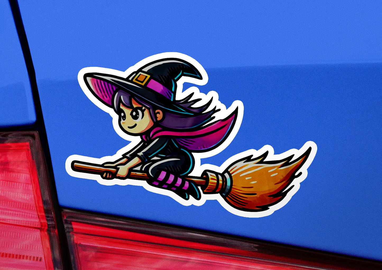a sticker of a witch flying on a broom