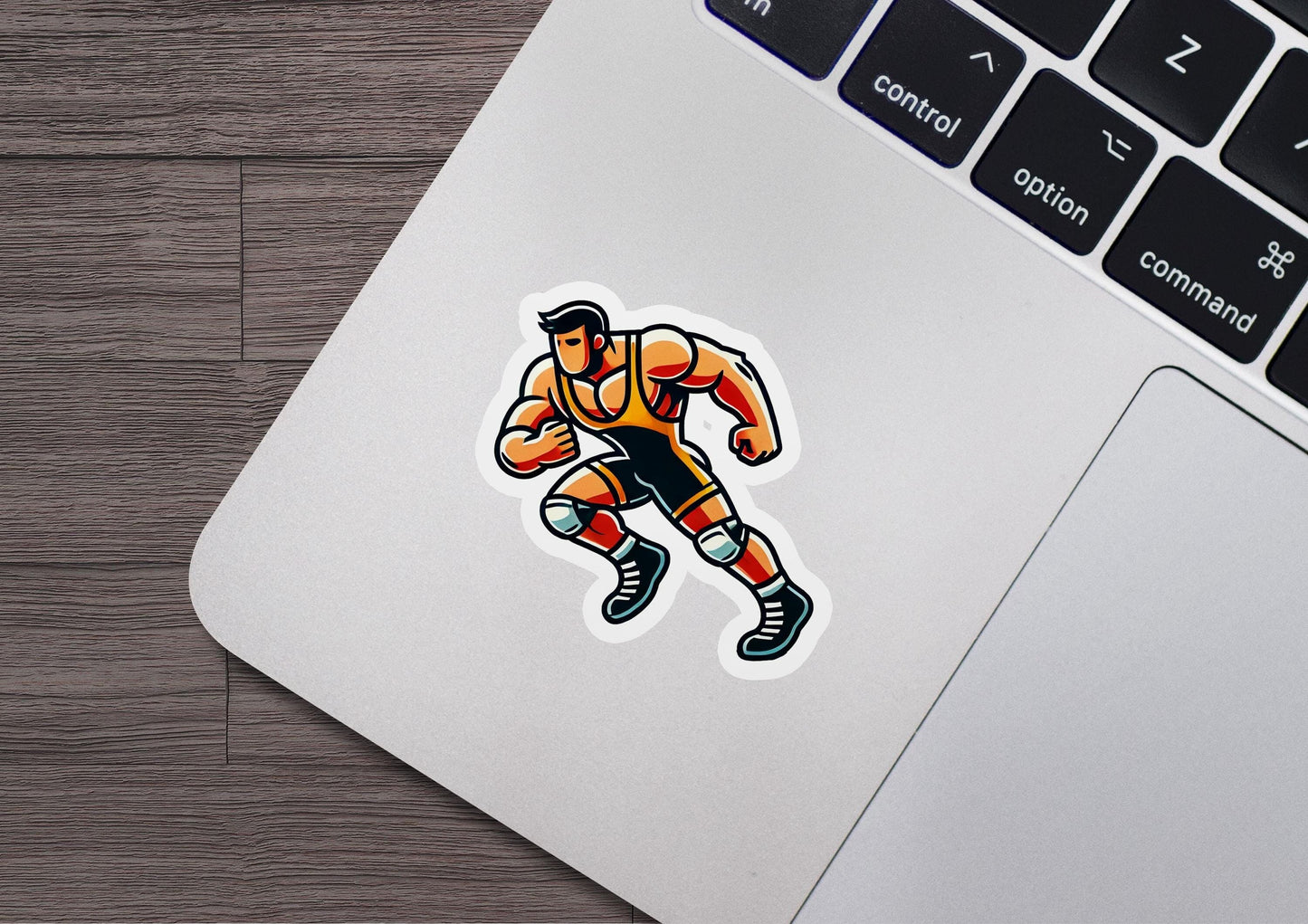 a laptop with a sticker of a basketball player