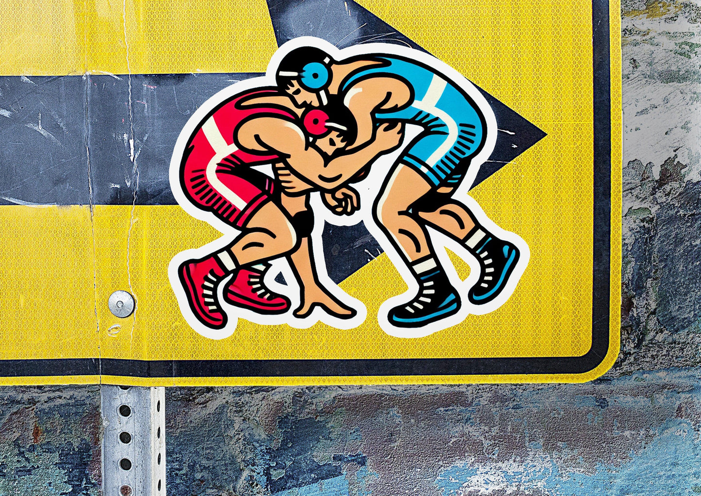 a sticker of two men wrestling each other