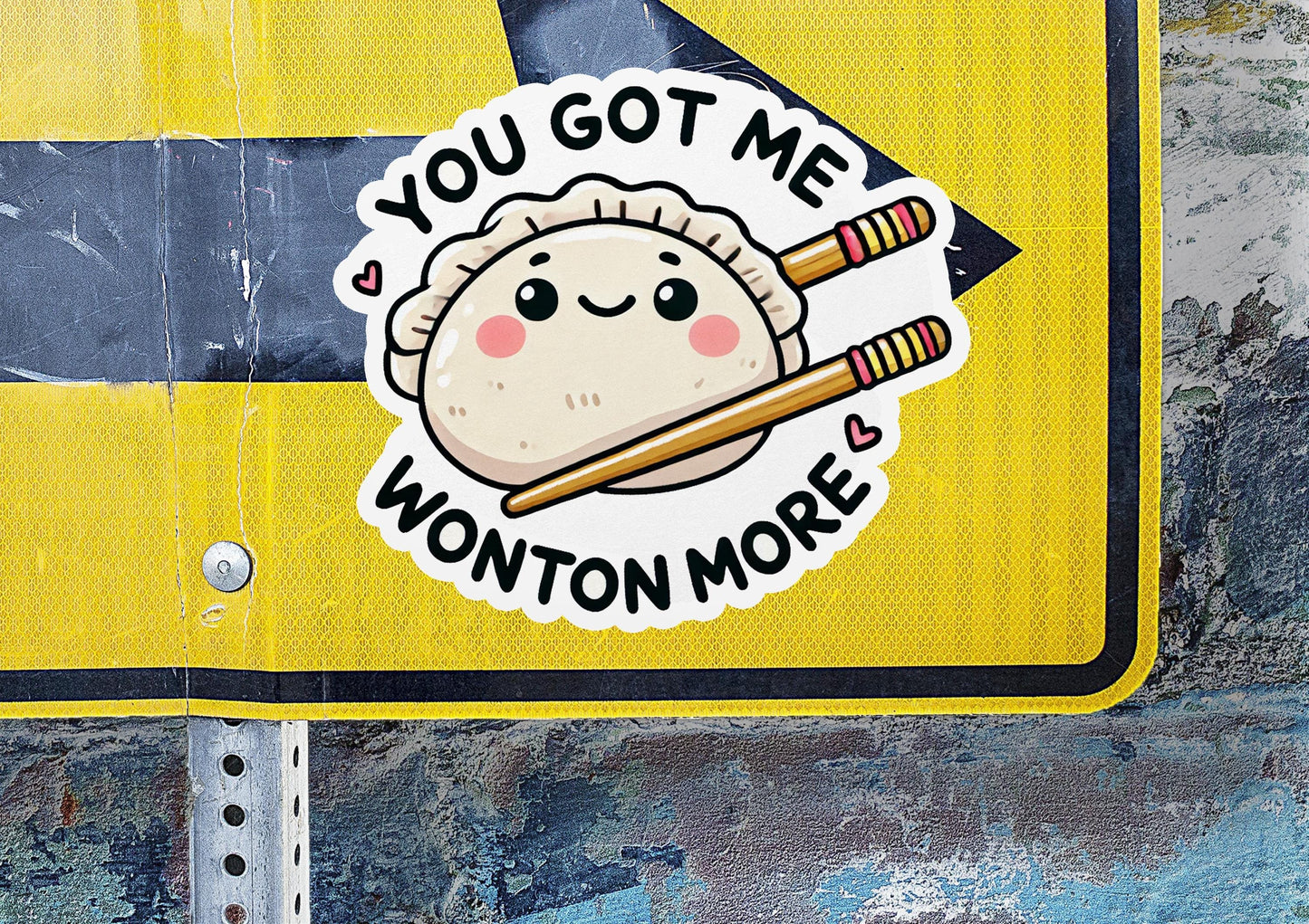 a street sign with a sticker on it