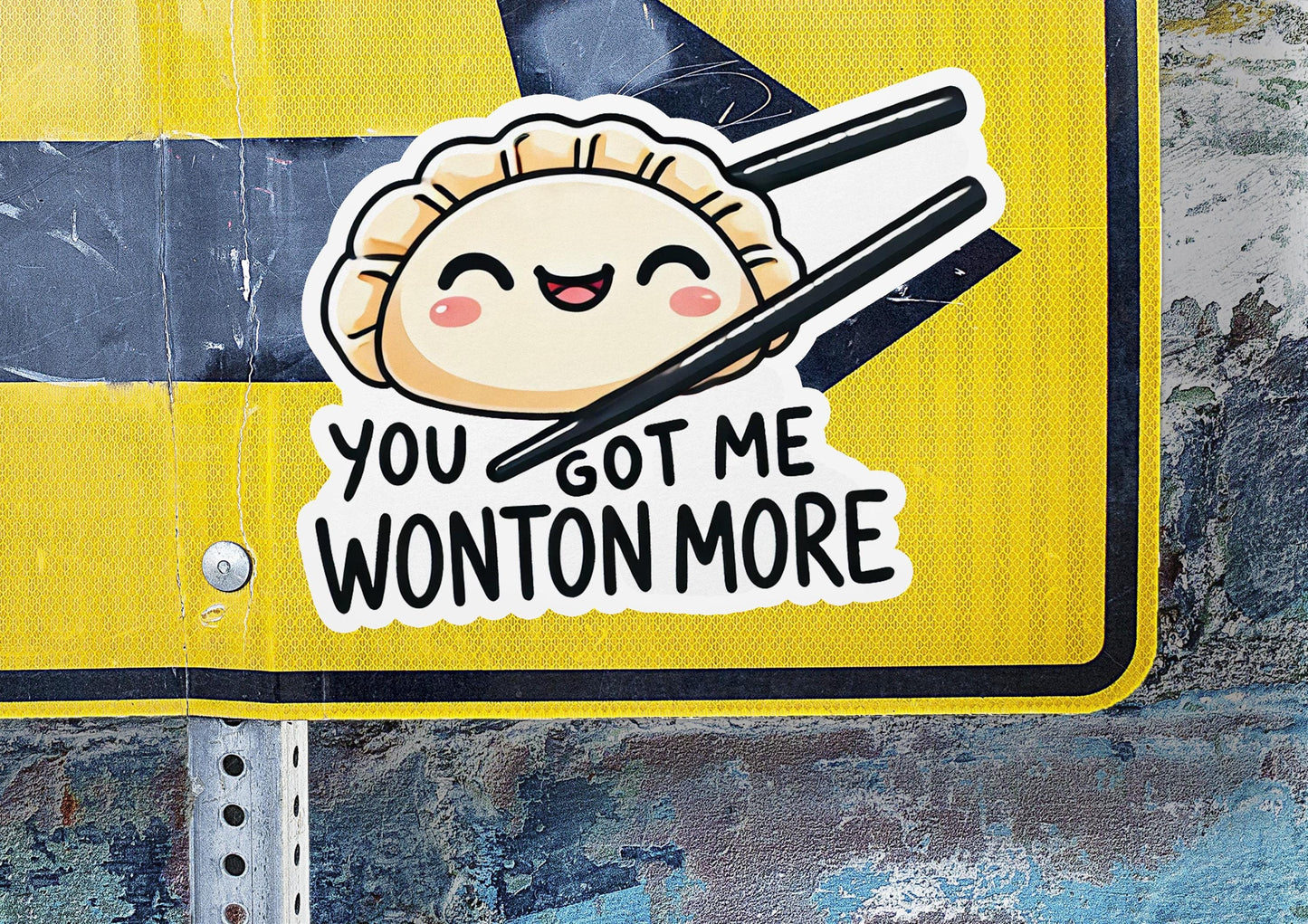 a street sign with a sticker on it