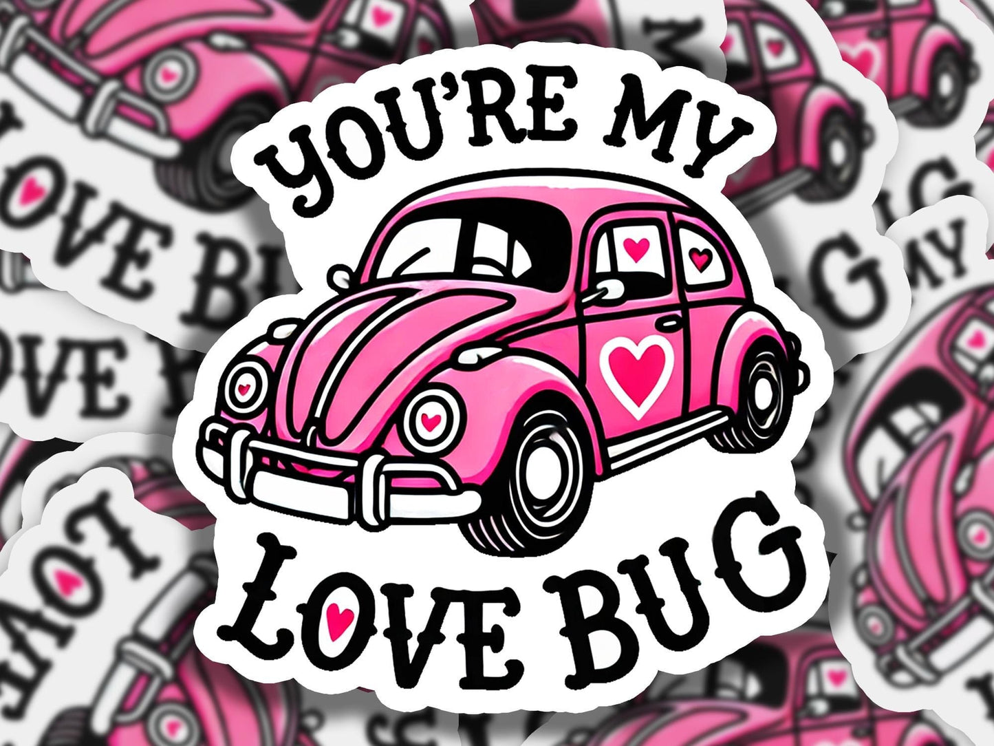 a pink vw bug sticker surrounded by pink hearts