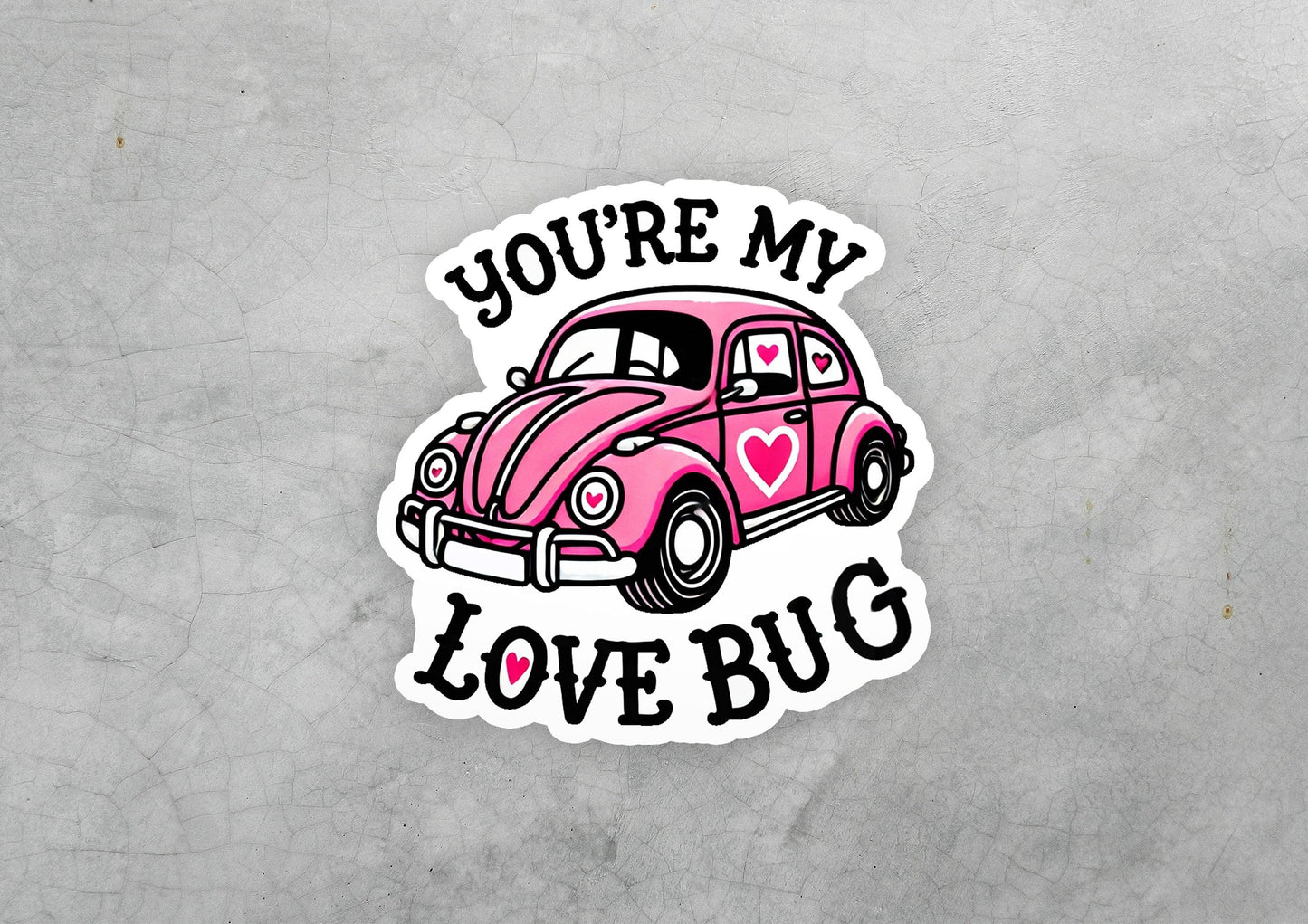 a sticker with a pink car and a heart on it
