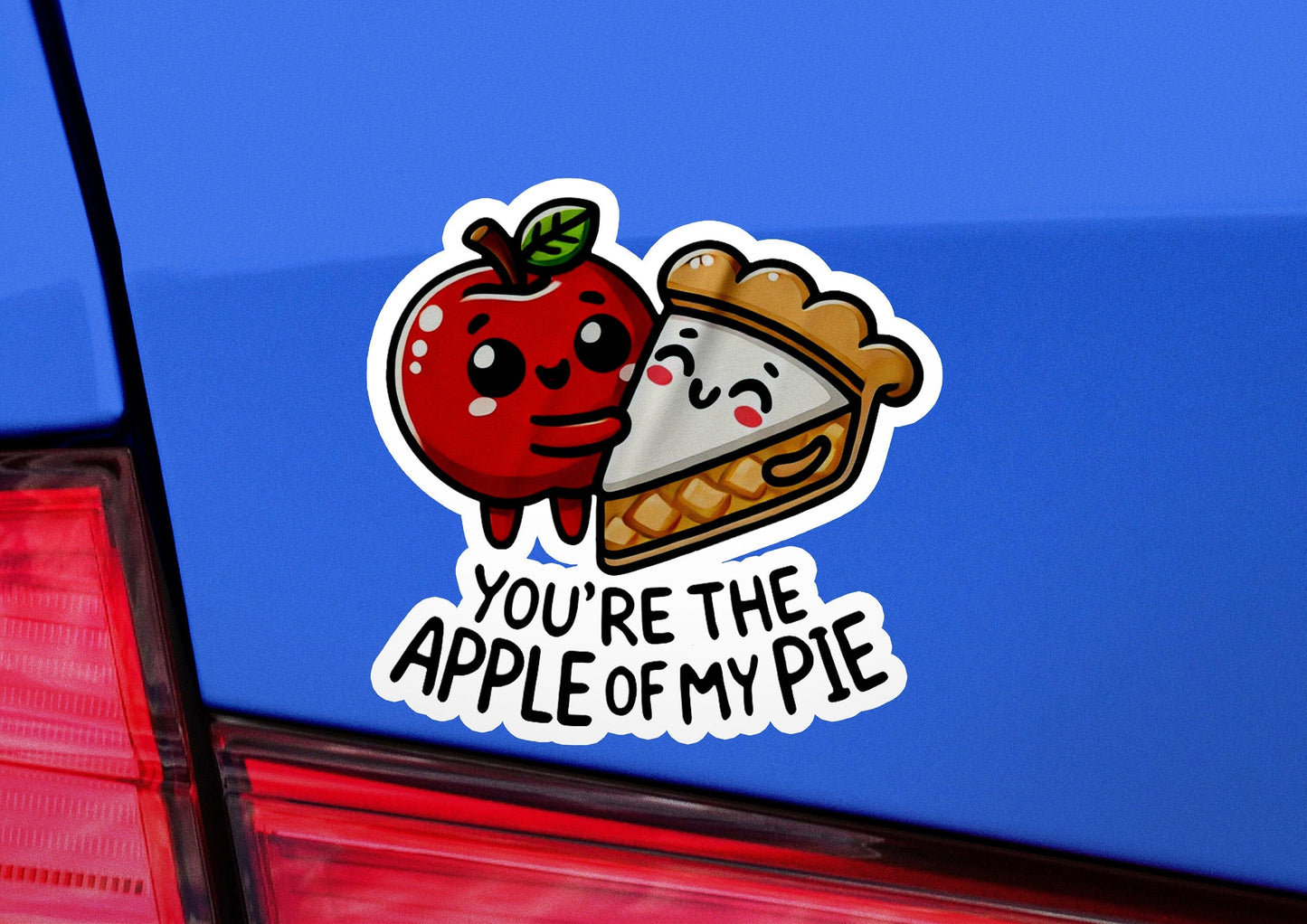 an apple and pie sticker on the back of a car