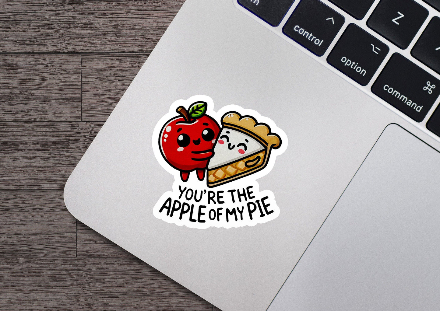 an apple pie sticker on a laptop