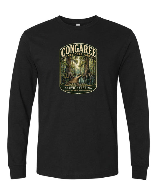 A black long-sleeve t-shirt with a graphic design depicting a forest scene with a path leading through it.