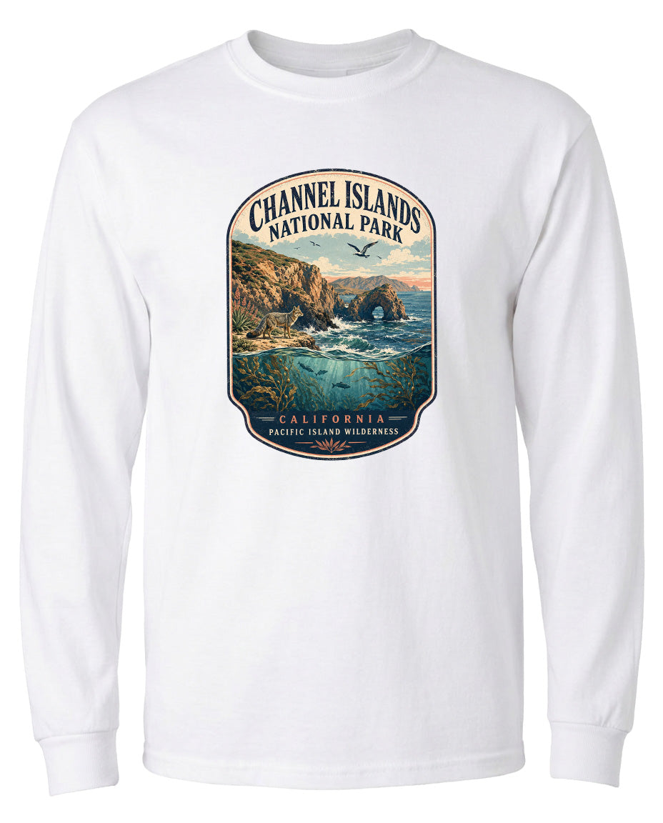 A white long-sleeved t-shirt with a graphic design depicting a scenic landscape featuring a coastal area, cliffs, and water.