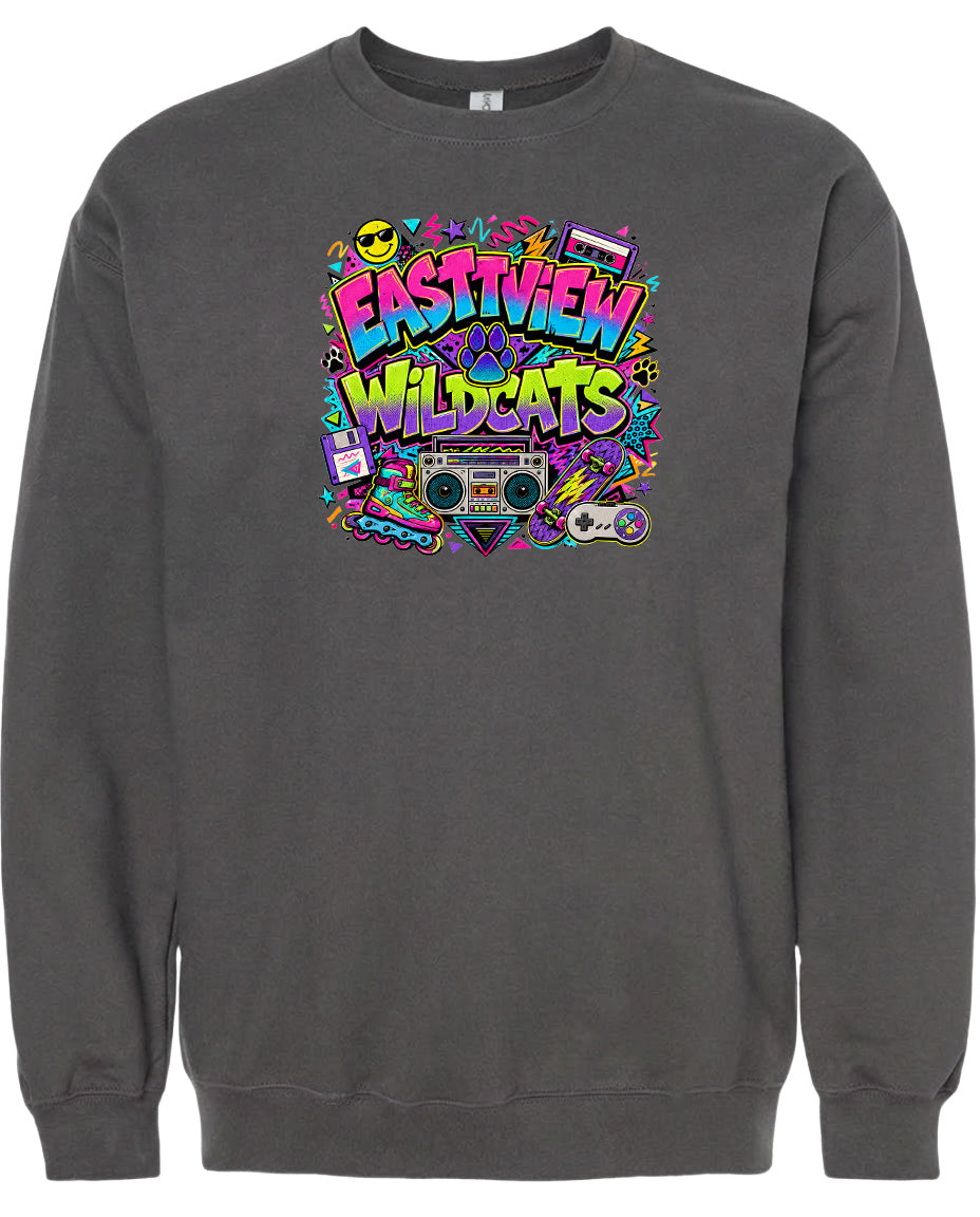 A gray sweatshirt with a colorful graphic design featuring the text "EASTVIEW WILDCATS" surrounded by various icons and symbols, such as a boombox, cassette tape, and other retro-style elements.