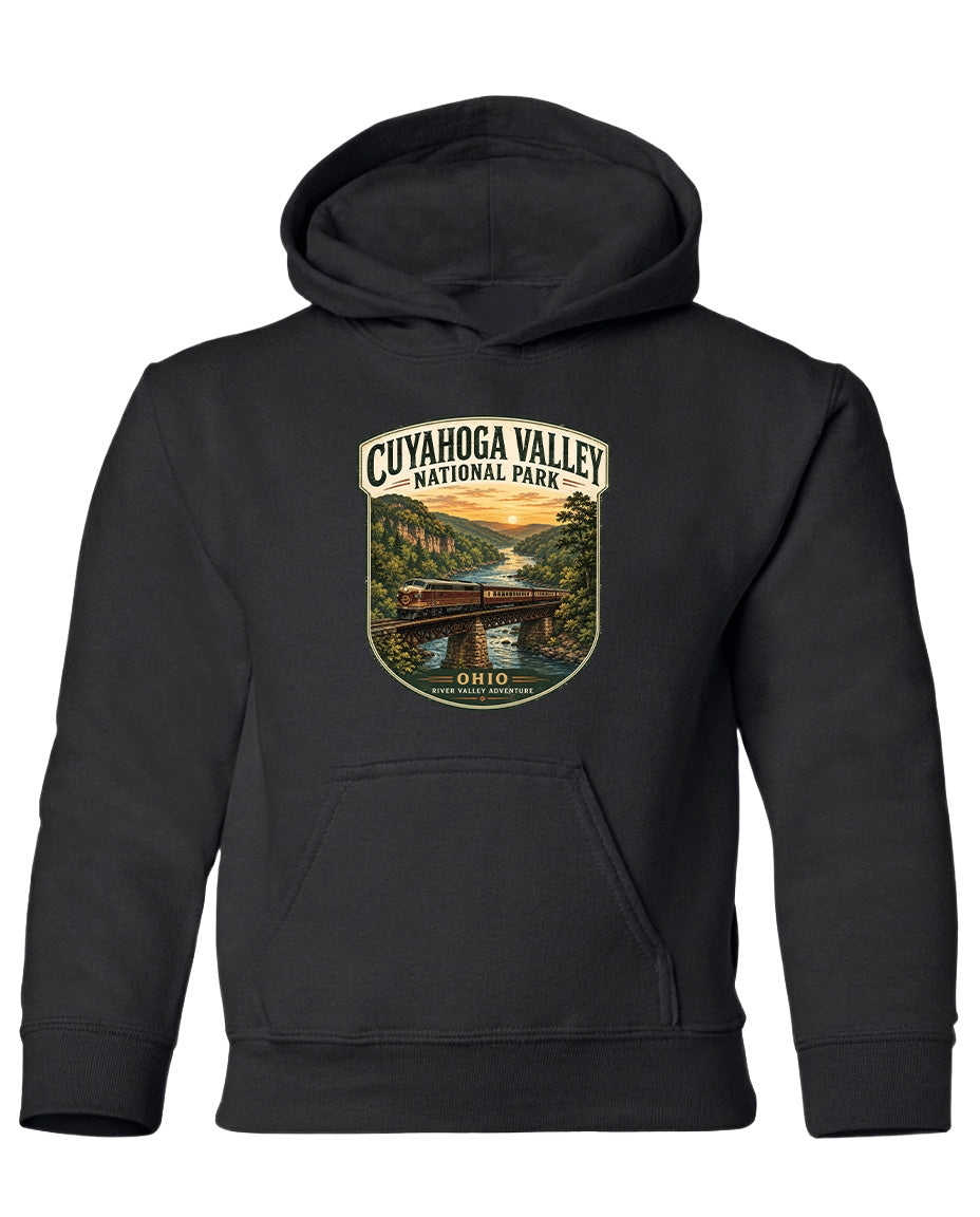 A black hoodie with a graphic design depicting a scenic view of Cuyahoga Valley National Park, featuring a bridge and a river.