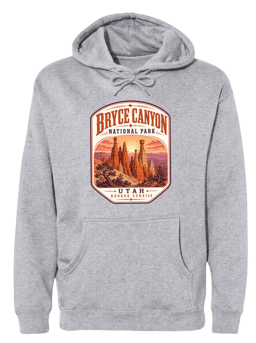 A gray hoodie with a graphic design depicting Bryce Canyon National Park and Utah.