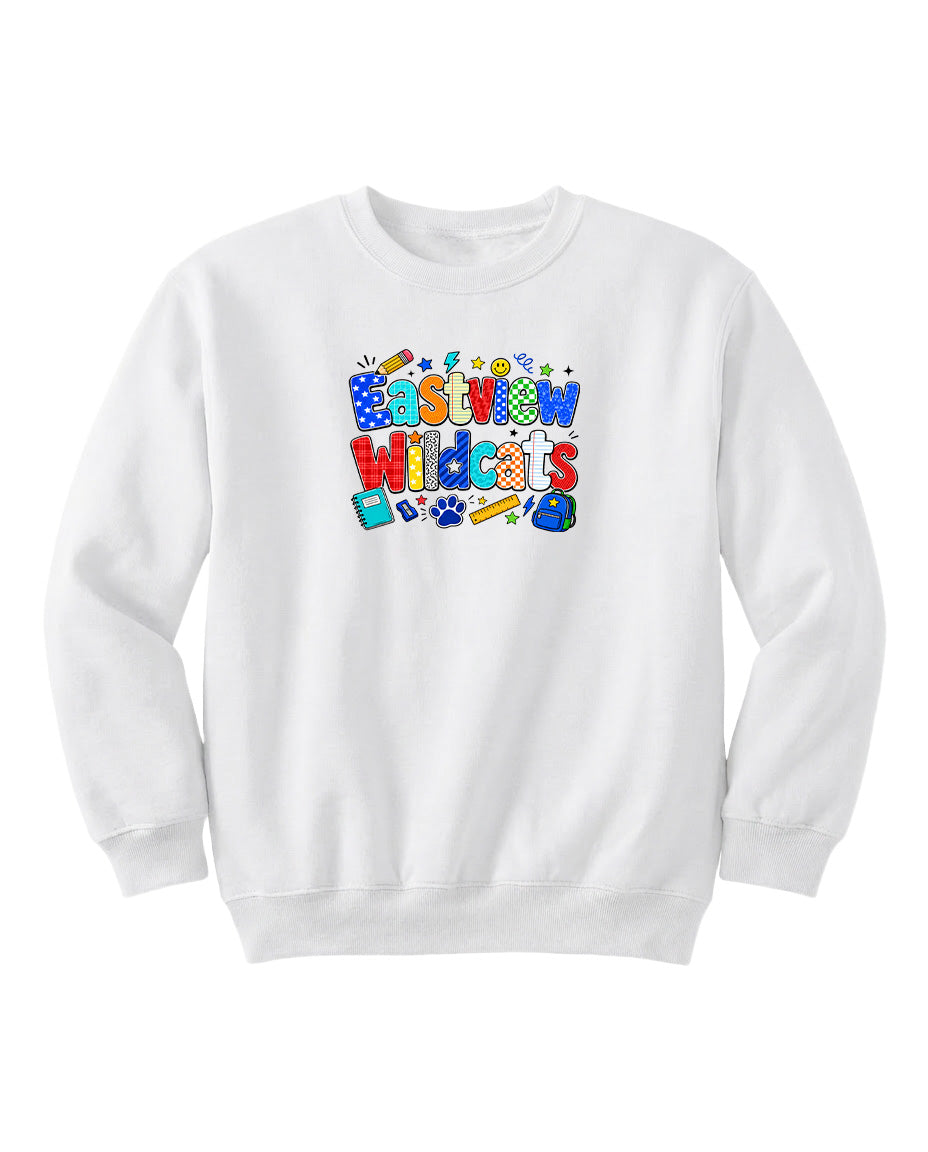 A white sweatshirt with a colorful graphic design featuring the text "Eastview Wildcats" and various school-related icons.