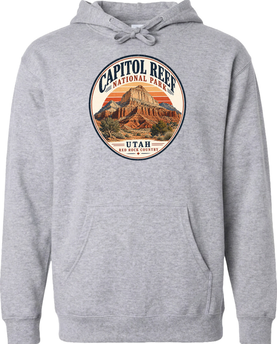 A gray hoodie with a circular design featuring the Capitol Reef National Park in Utah.