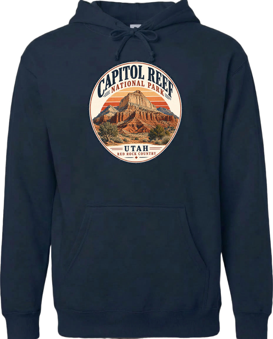 A navy blue hoodie with a circular graphic design featuring the Capitol Reef National Park in Utah.