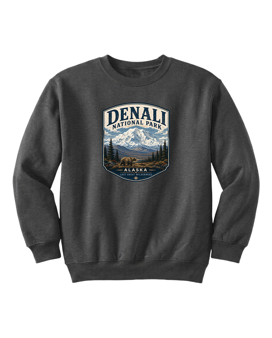 A gray sweatshirt with a graphic design featuring a mountain landscape and bears, along with the text "DENALI NATIONAL PARK ALASKA".