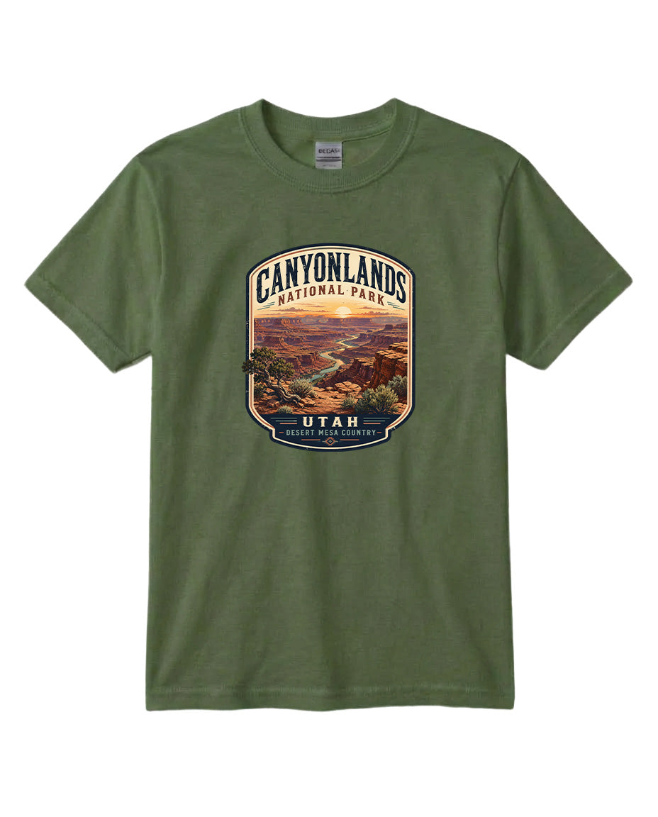 A green t-shirt with a graphic design depicting a scenic landscape, specifically the Canyonlands National Park in Utah.