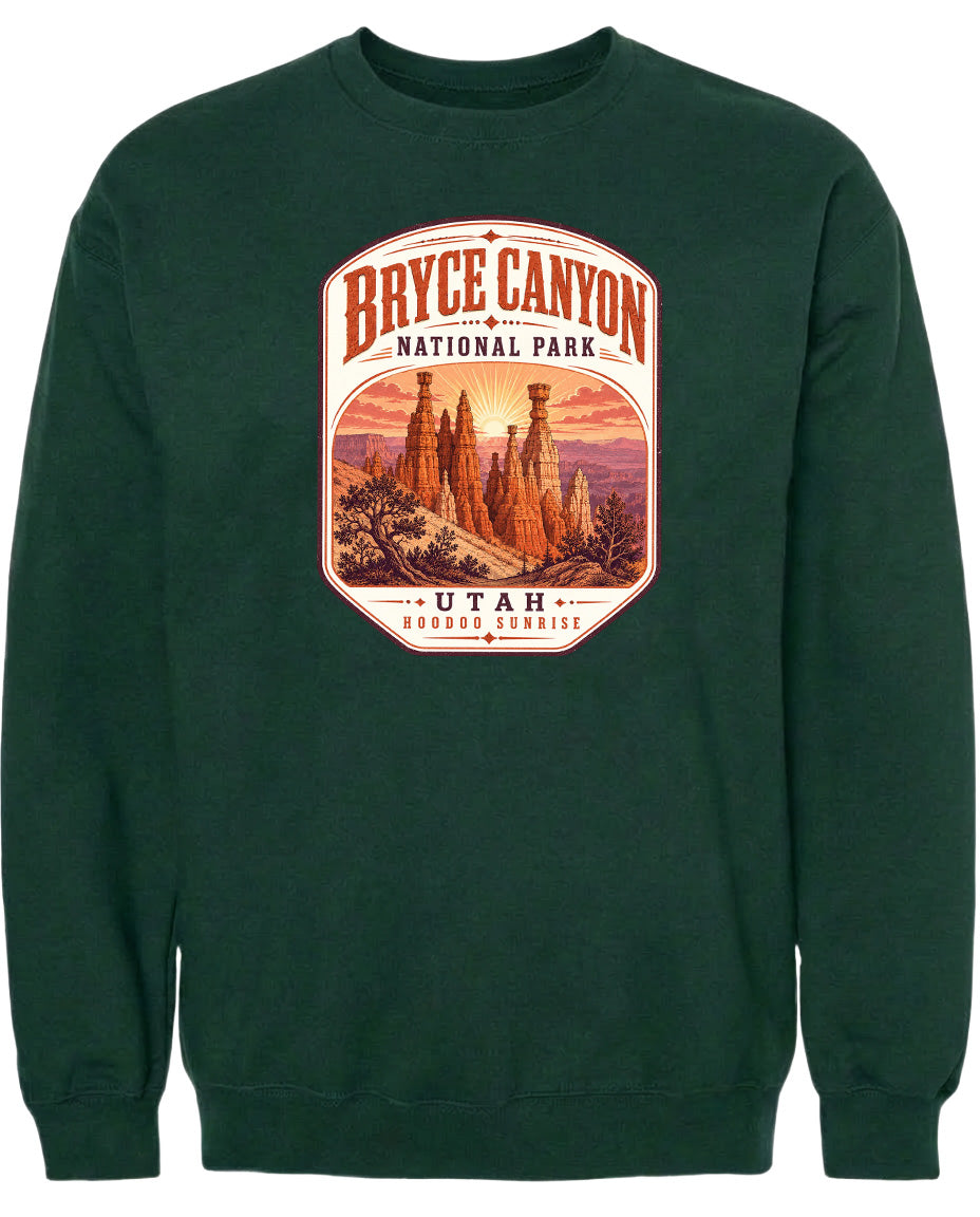 A green sweatshirt with a graphic design depicting the Bryce Canyon National Park in Utah.