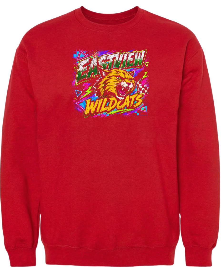 A red sweatshirt with a graphic design featuring a fierce-looking tiger or lion's head surrounded by colorful, abstract shapes and text.