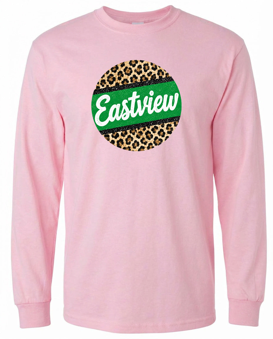 A pink long-sleeved shirt with a circular logo on the front. The logo features a leopard print design with a green border and the word "Eastview" written in white cursive text.