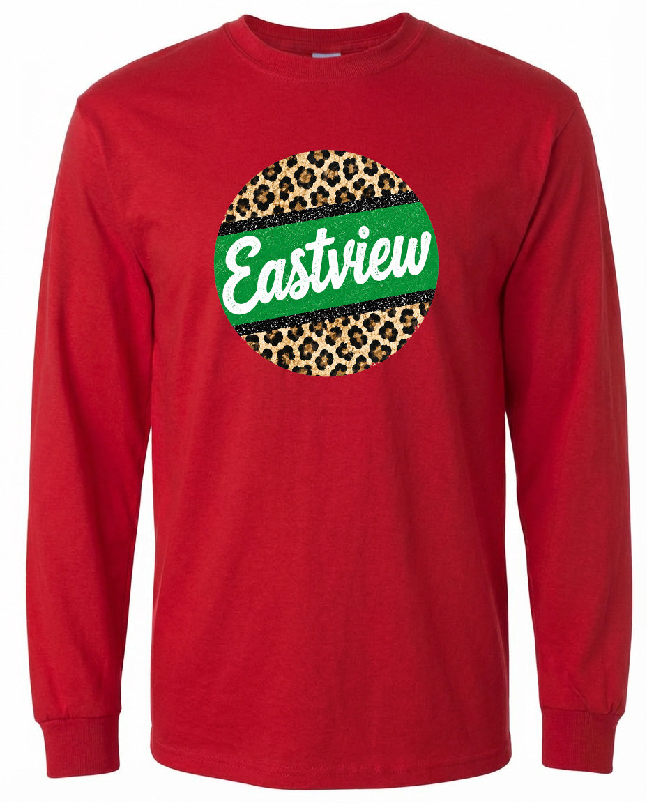 A red long-sleeved shirt with a circular logo on the front. The logo features a leopard print design with a green border.