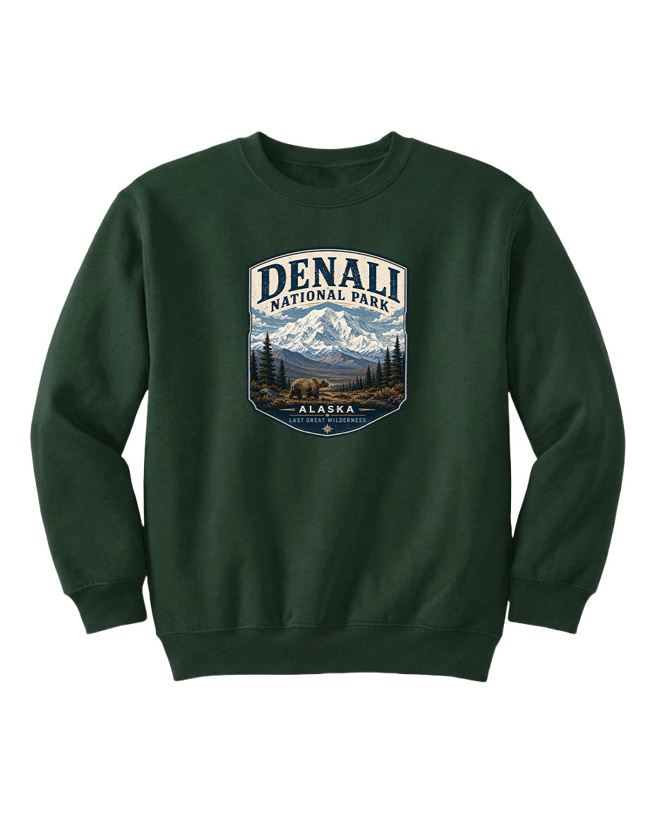 A green sweatshirt with a graphic design featuring a mountain landscape and bears, representing Denali National Park in Alaska.