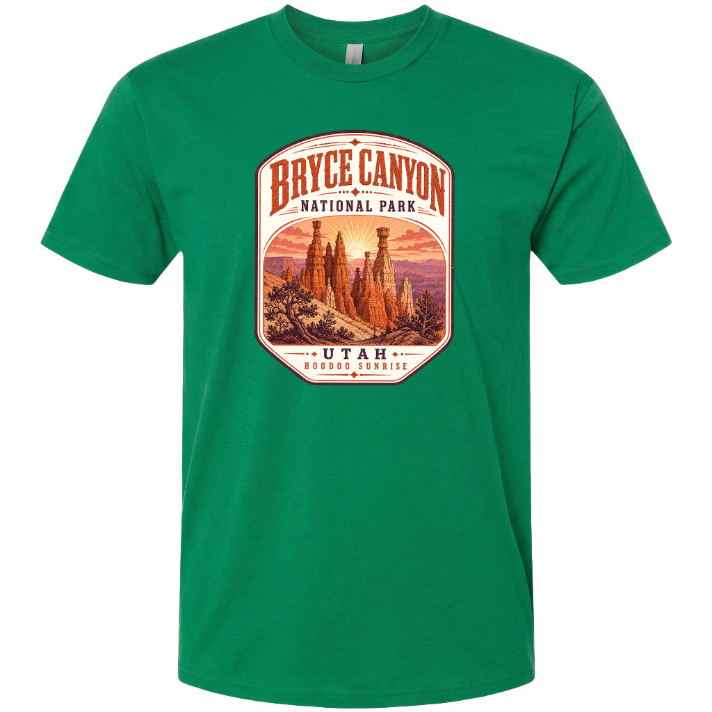 A green t-shirt with a graphic design depicting the Bryce Canyon National Park in Utah.