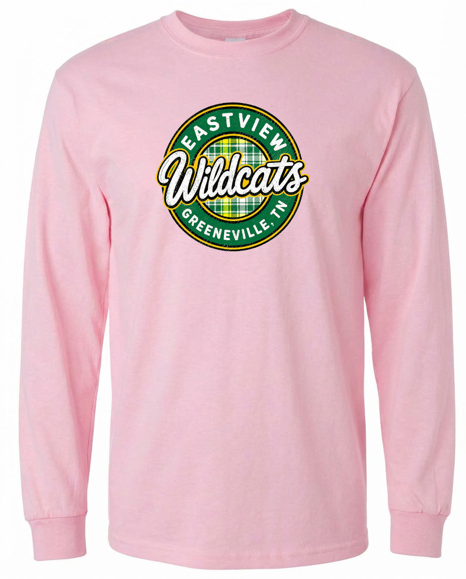 A pink long-sleeved t-shirt with a circular logo on the front.