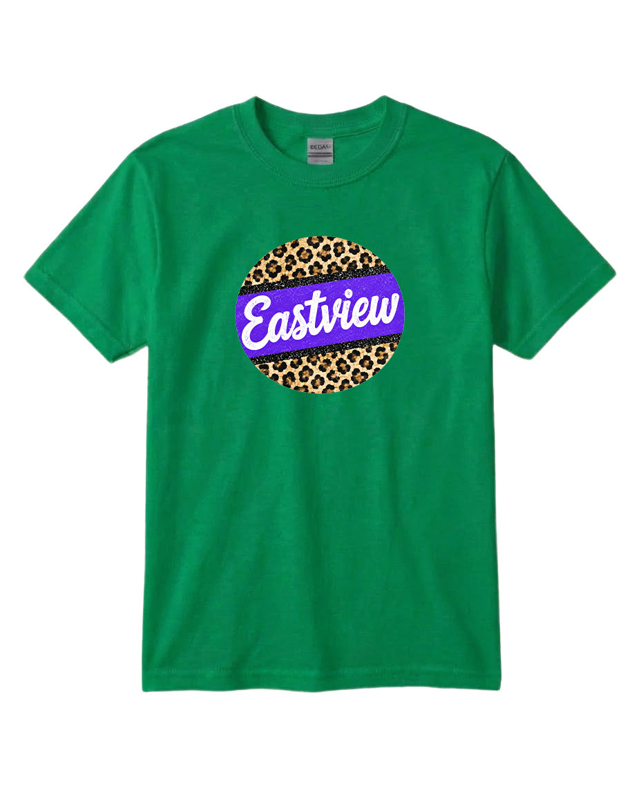 A green t-shirt with a circular graphic design on it. The design consists of a leopard print circle with the word "Eastview" written in purple text inside it.