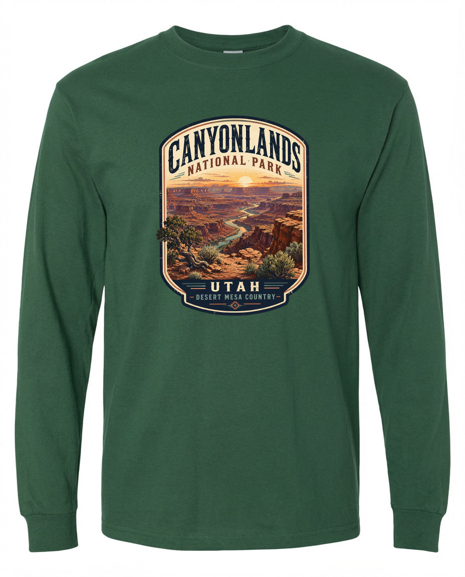 A green long-sleeved t-shirt with a graphic design depicting the scenic landscape of Canyonlands National Park in Utah.