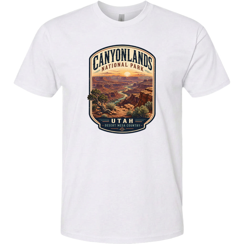 A white t-shirt with a graphic design depicting a scenic view of the Canyonlands National Park in Utah.