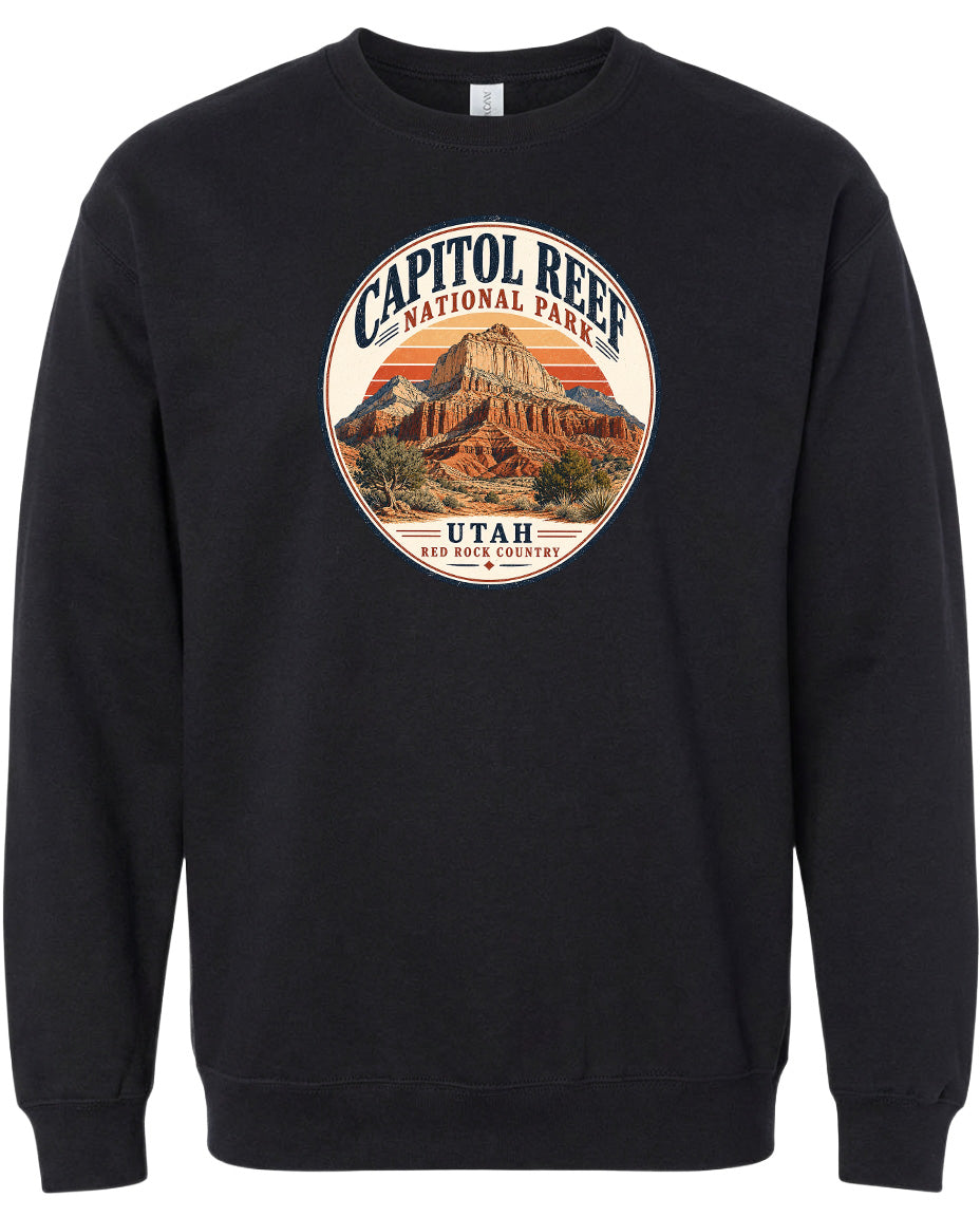 A black sweatshirt with a circular graphic design featuring the Capitol Reef National Park in Utah.