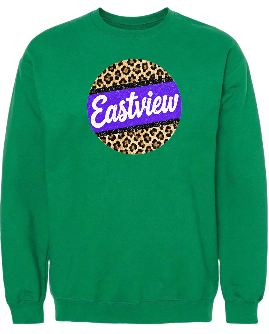 A green sweatshirt with a purple and leopard print circular logo on the front.