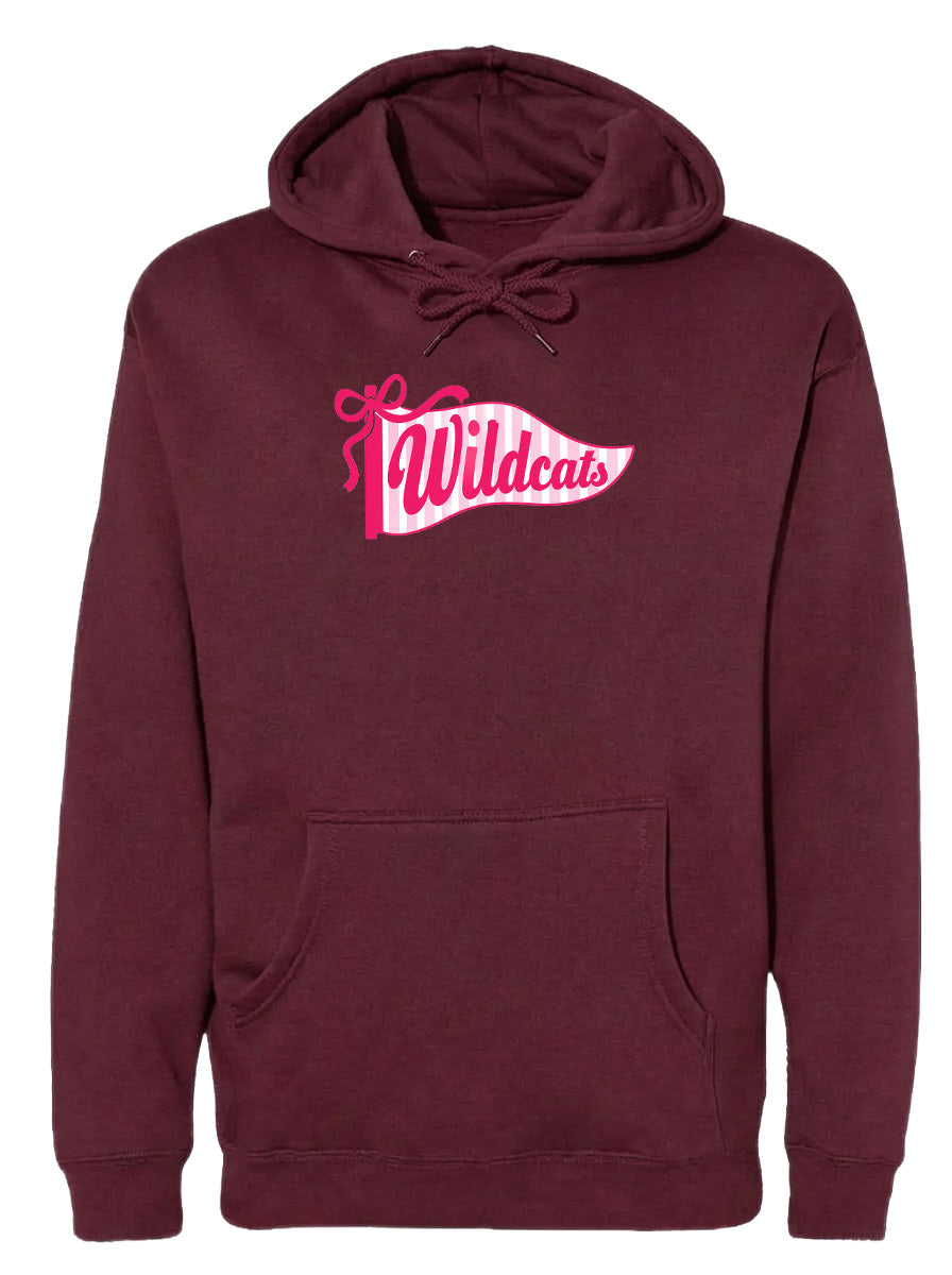 A burgundy hoodie with a pink and white banner that says "Wildcats" on it.