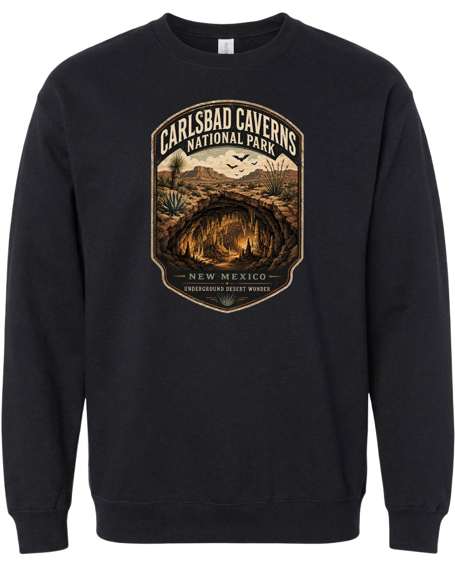 A black sweatshirt with a graphic design depicting the Carlsbad Caverns National Park in New Mexico.