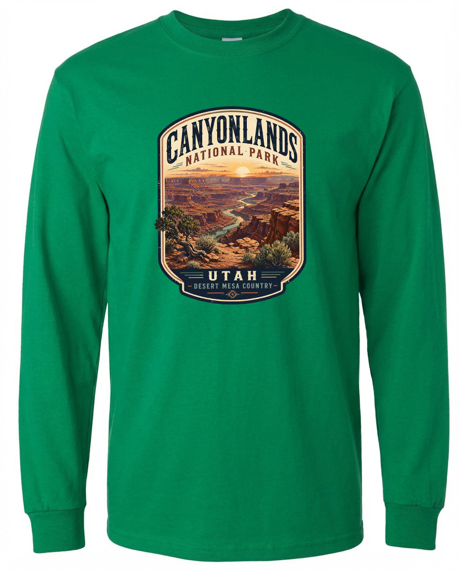 A green long-sleeved t-shirt with a graphic design depicting the Canyonlands National Park in Utah.
