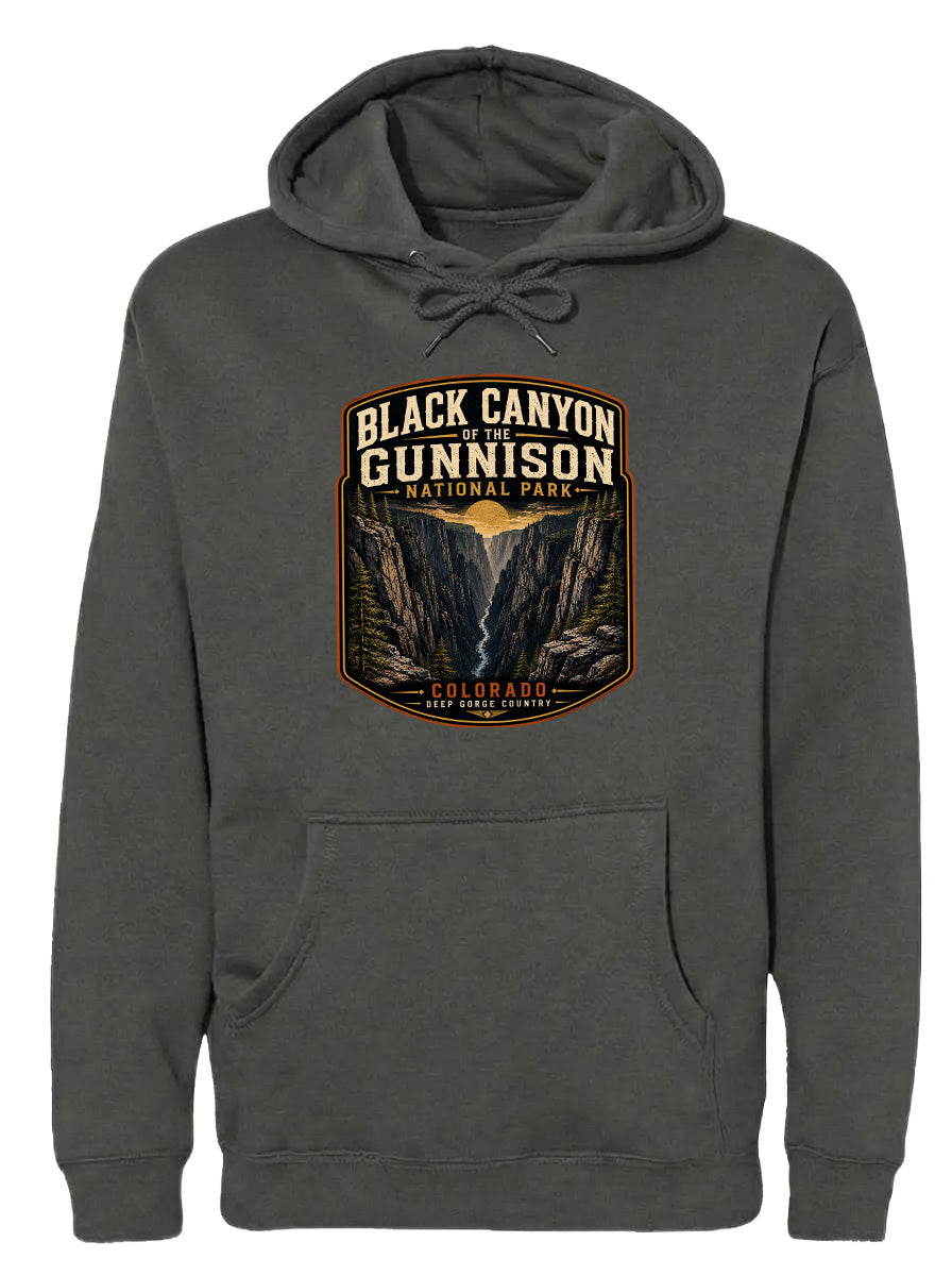 A gray hoodie with a graphic design depicting the Black Canyon of the Gunnison National Park in Colorado.