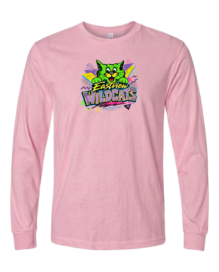 A pink long-sleeved t-shirt with a colorful graphic design featuring a cartoon cat and the text "Easter Wildcats".