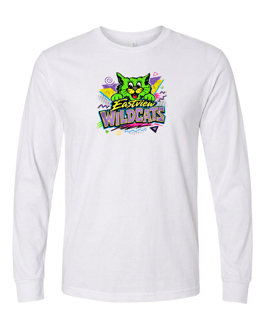 A white long-sleeved t-shirt with a colorful graphic design featuring a cartoon cat and the text "Easter Wildcats".